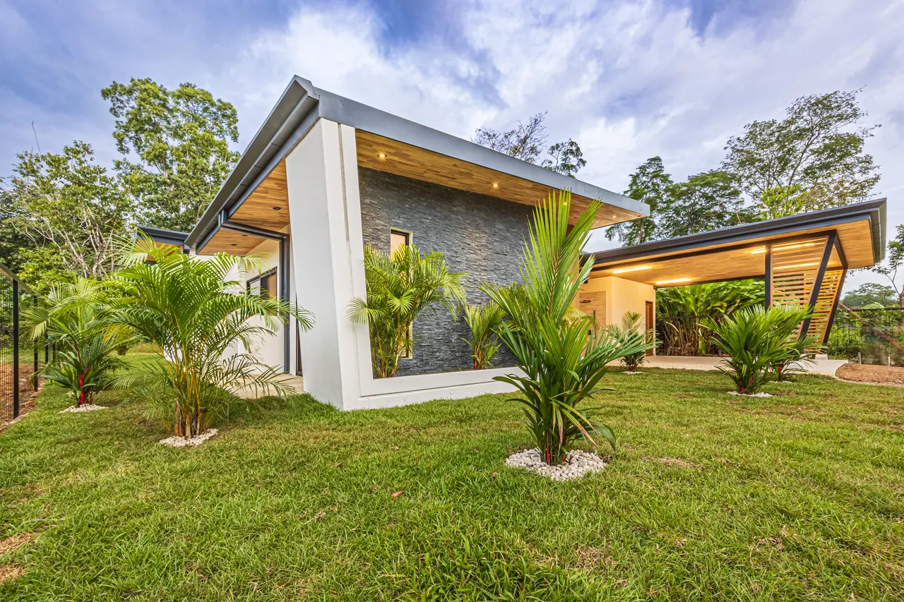 Exterior — stone gable and floating roof plane