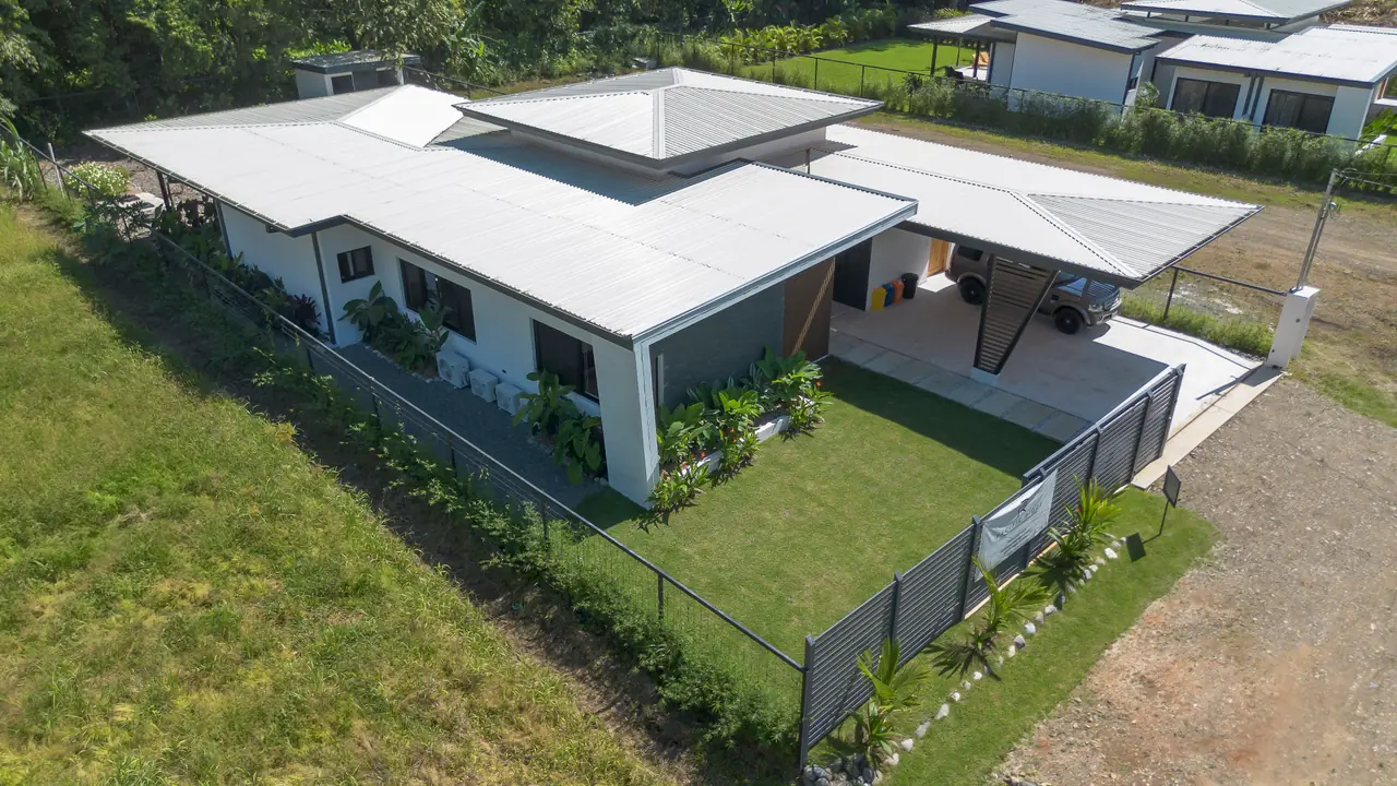 Casa Pacífico from the air — roofline, carport and parcel