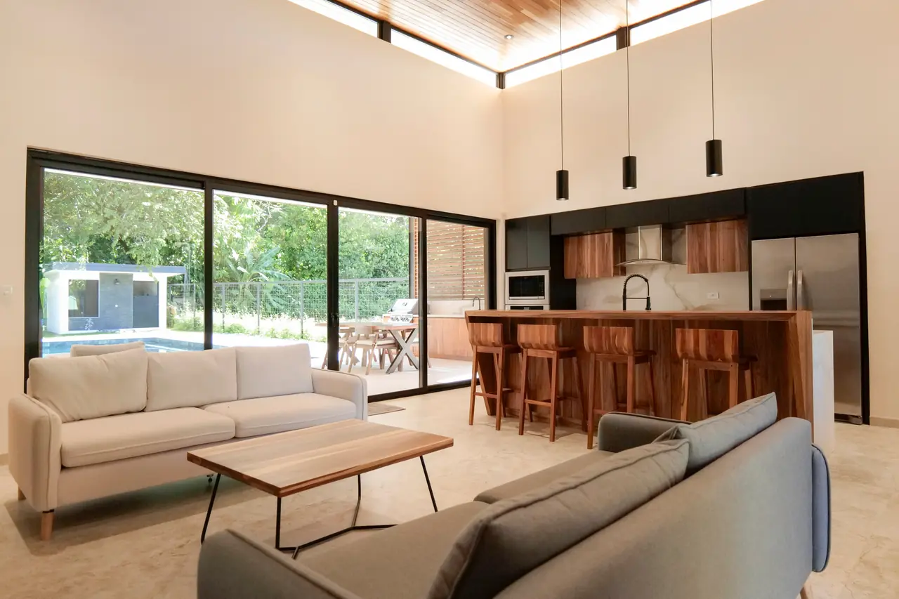 Open living and kitchen looking out to the pool