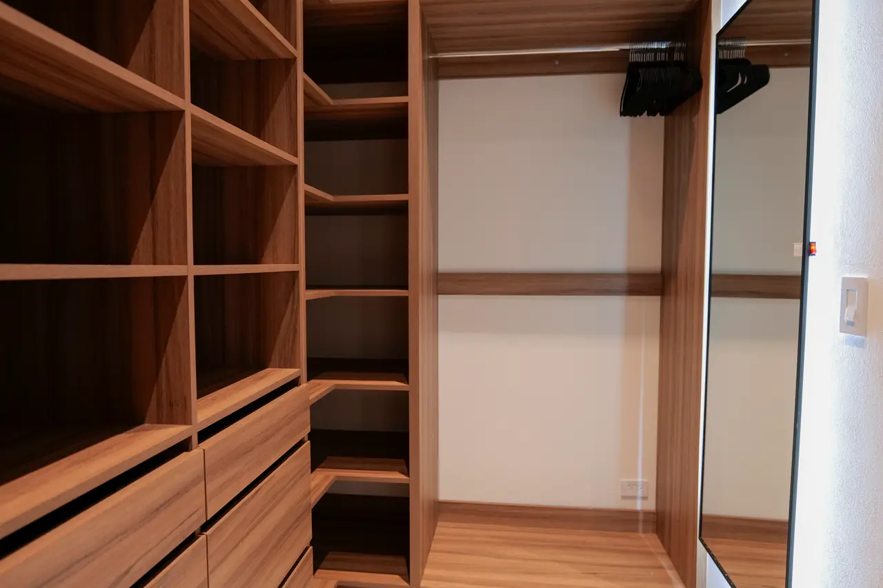 Walk-in wardrobe built in solid hardwood
