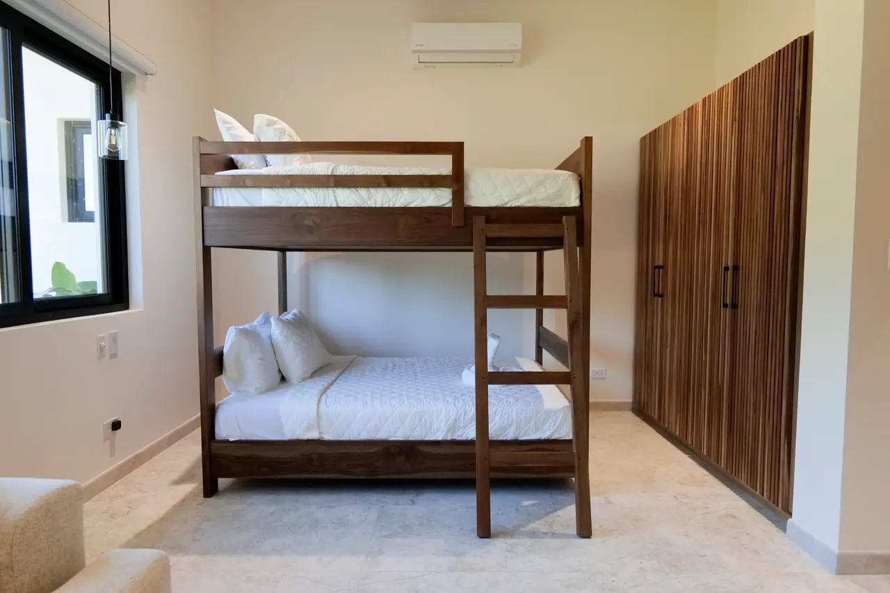 Bunk room bunk beds in solid hardwood with built-in storage